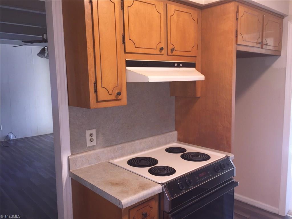 2208 Timberlake Avenue High Point, NC 27265 - Photo 6 of 18 Kitchen slide-in stove and area for a refrigerator