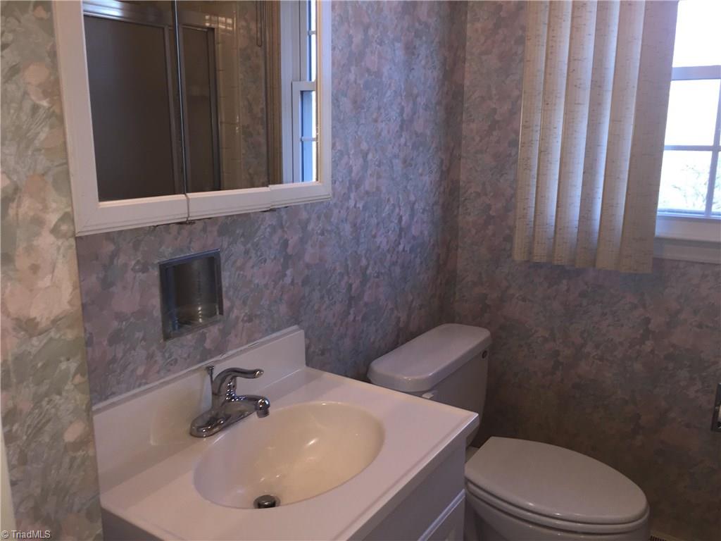 2208 Timberlake Avenue High Point, NC 27265 - Photo 10 of 18 Hall full bath - you can see shower in the mirror