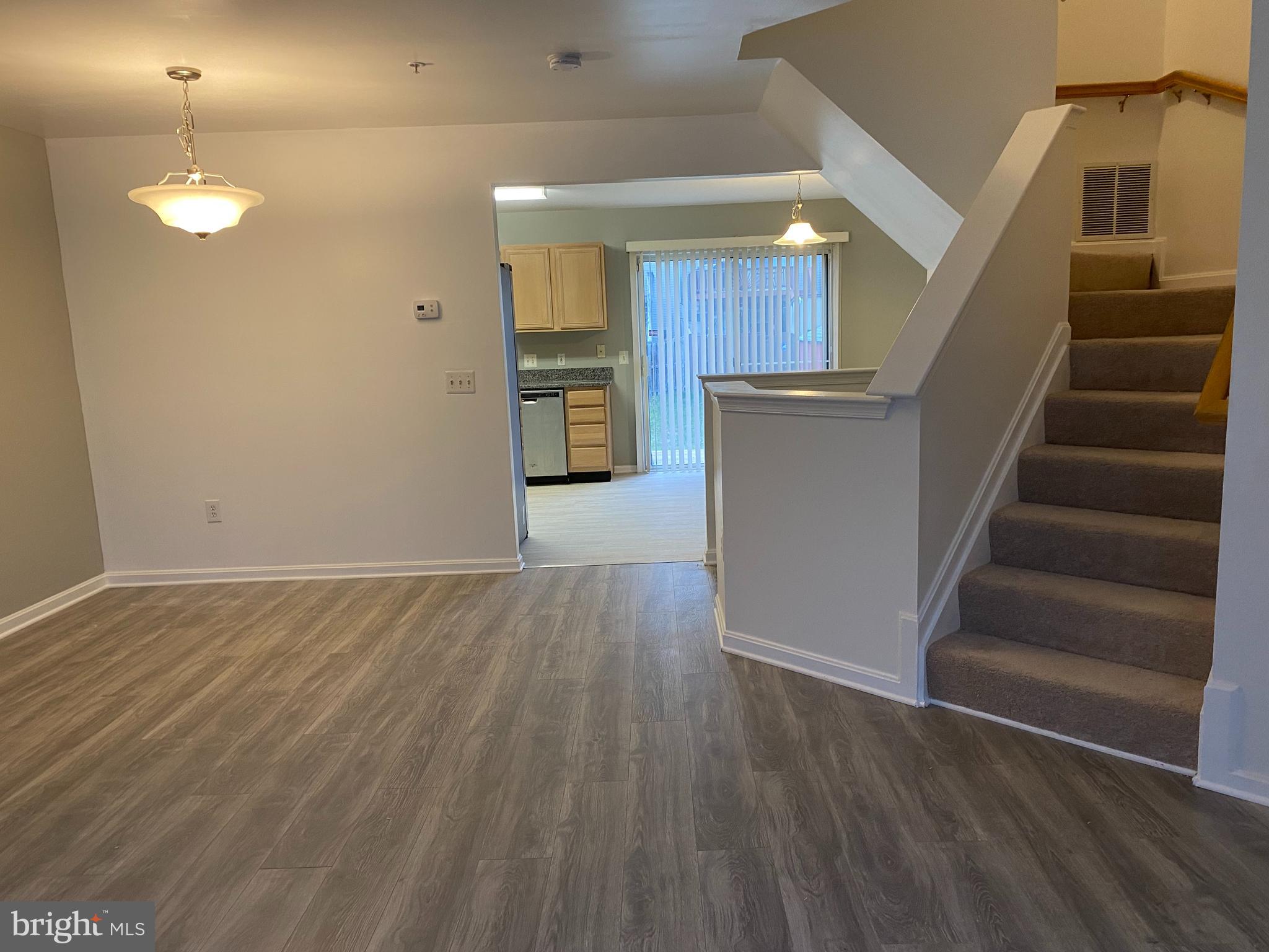 6529 Ridgeborne Drive Baltimore, MD 21237 - Photo 8 of 26 Living room/dining room with kitchen view