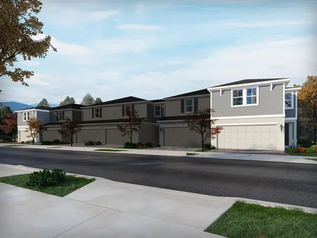 a view of a street in front of a house