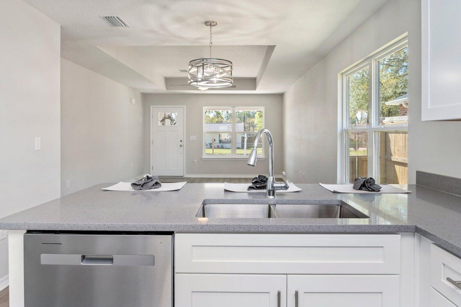 3161 Haskell Langley Road Crestview, FL 32539 - Photo 12 of 36 a view with a sink and chandelier