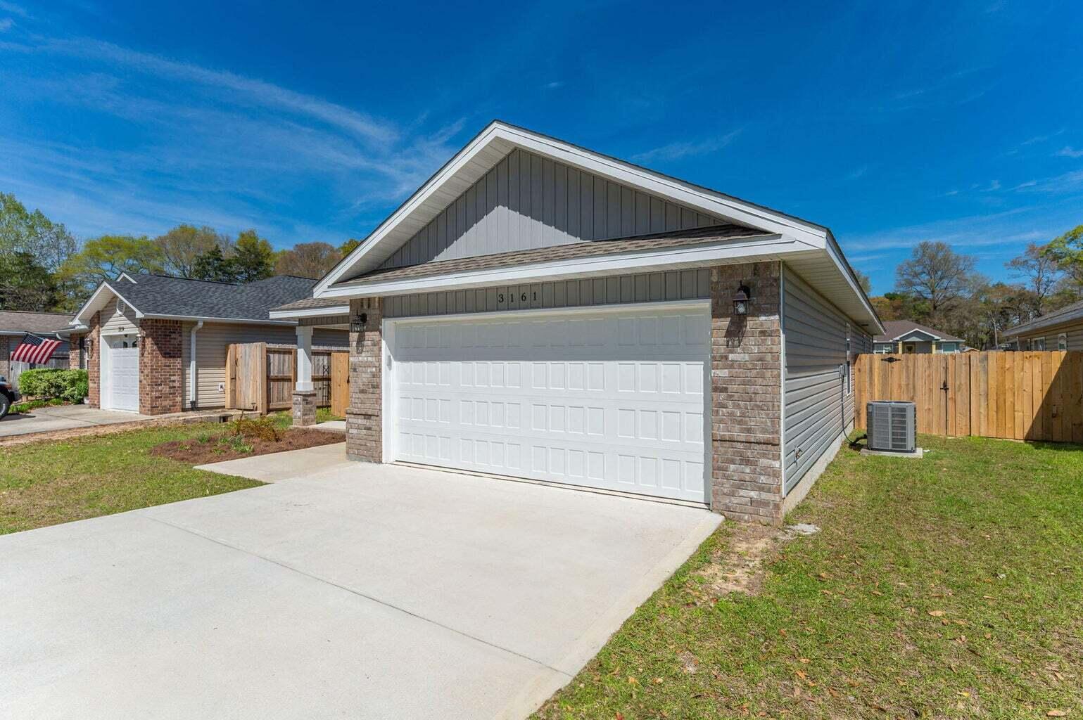 3161 Haskell Langley Road Crestview, FL 32539 - Photo 3 of 36 a front view of house with yard and green space