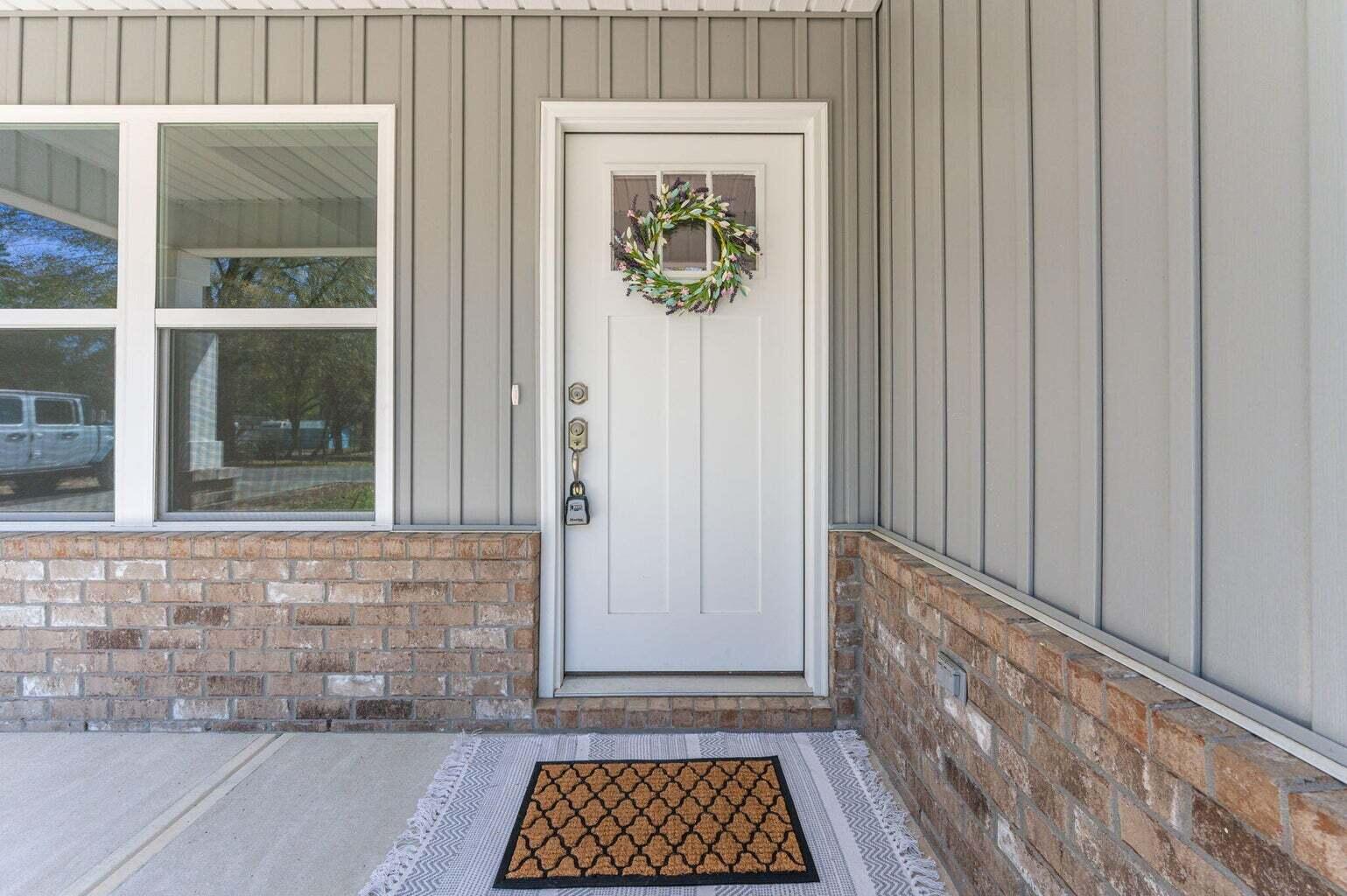 3161 Haskell Langley Road Crestview, FL 32539 - Photo 4 of 36 a view of front door with wooden floor
