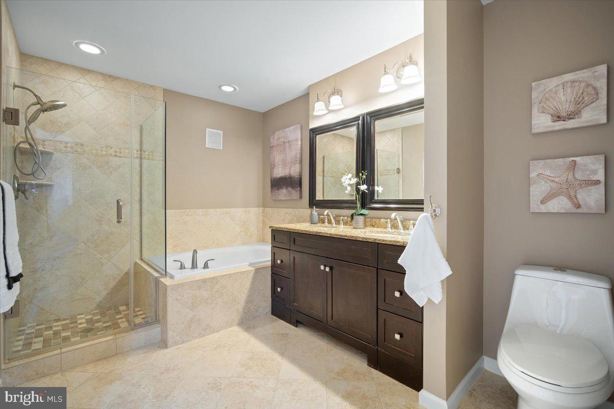 607 Gatestone Street Gaithersburg, MD 20878 - Photo 22 of 31 Spa like Primary Bath with separate tub and shower