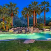 a view of a golf course with a fountain