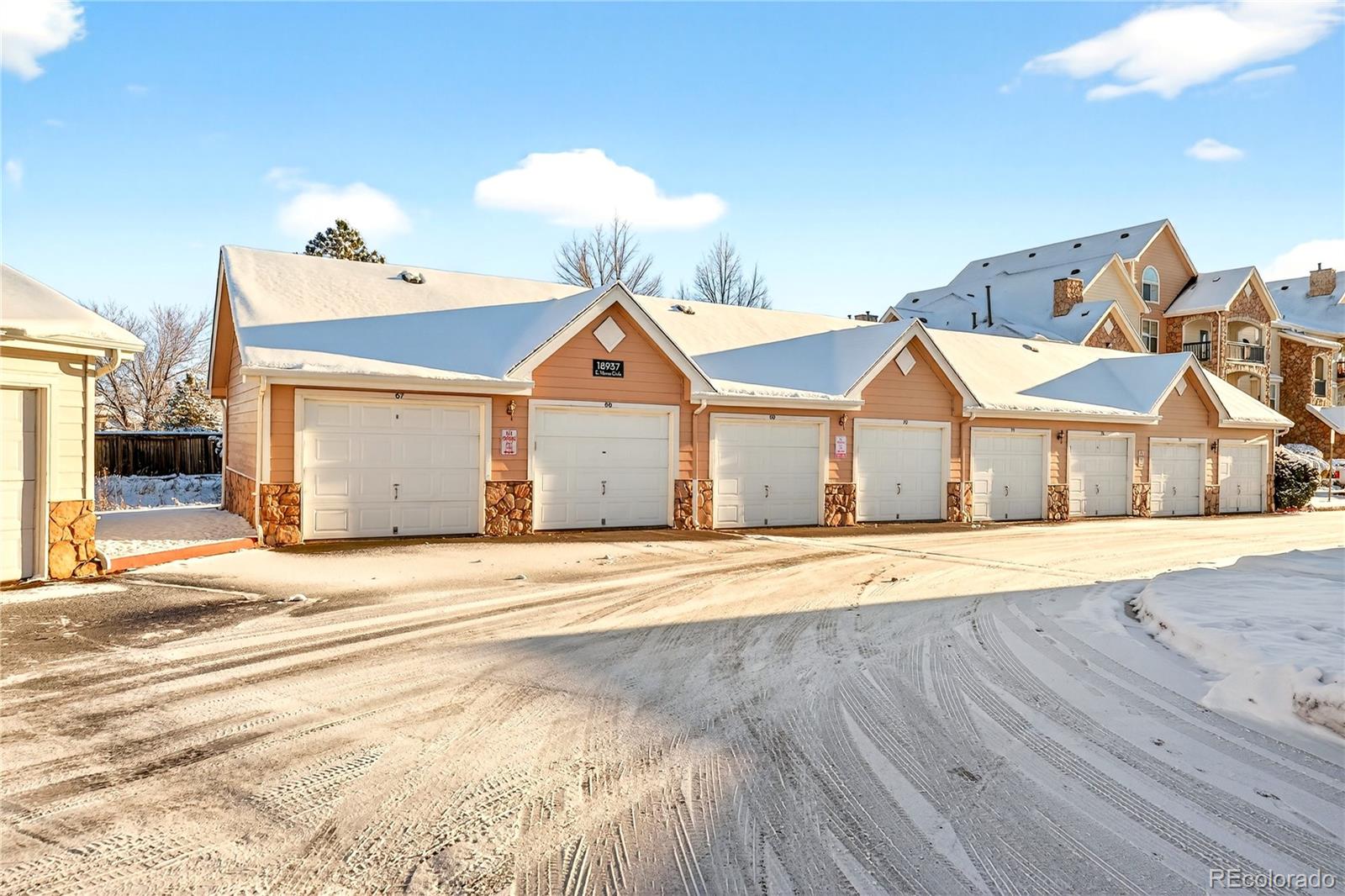 18929 East Warren Circle, Unit C205 Aurora, CO 80013 - Photo 33 of 46 a view of an house with backyard space and wooden floor