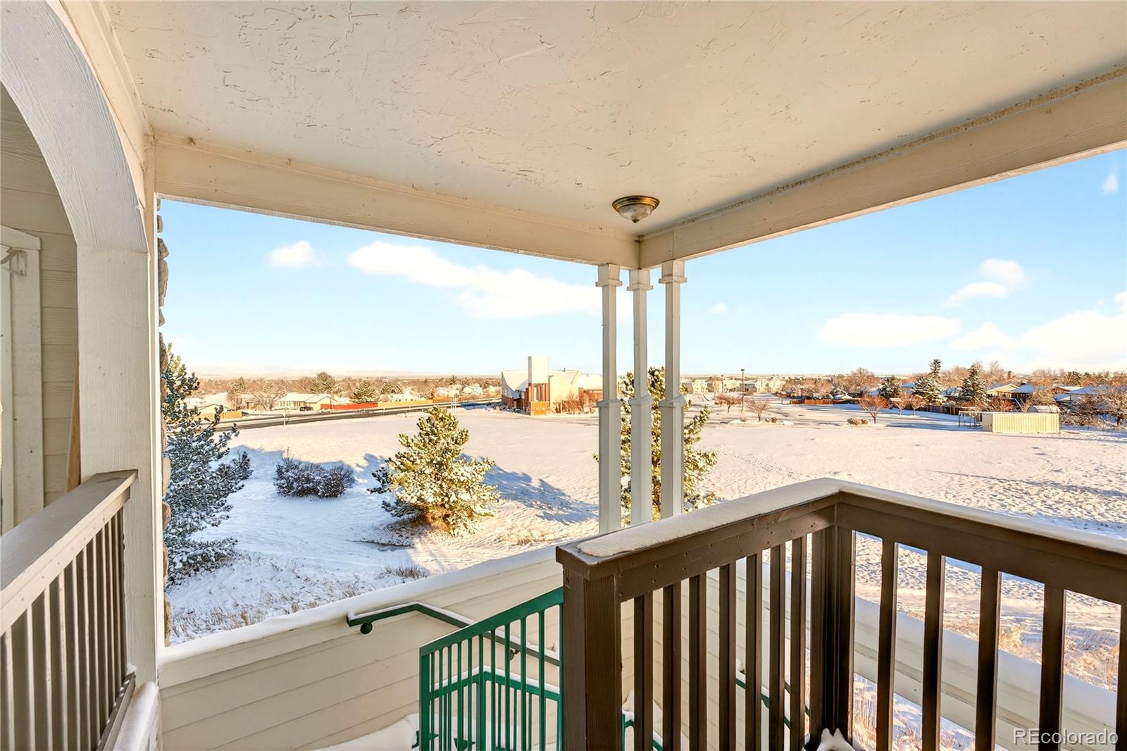 18929 East Warren Circle, Unit C205 Aurora, CO 80013 - Photo 6 of 46 a view of roof deck with furniture