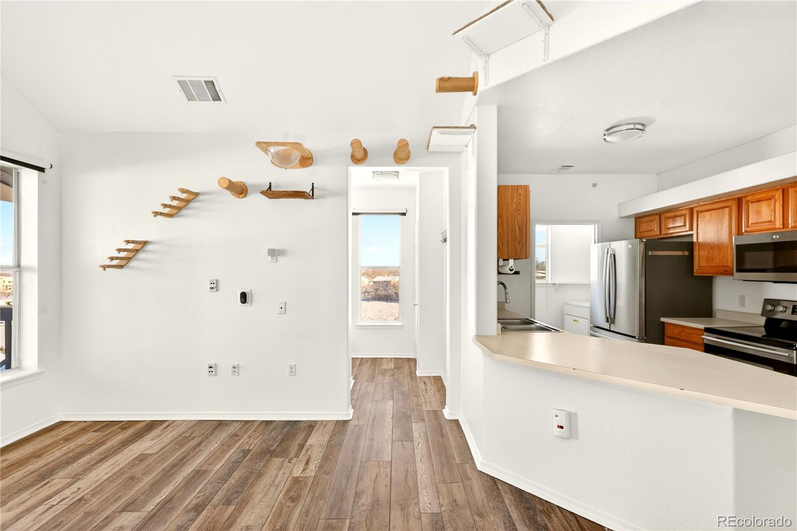 18929 East Warren Circle, Unit C205 Aurora, CO 80013 - Photo 9 of 46 a very nice looking room with a large window