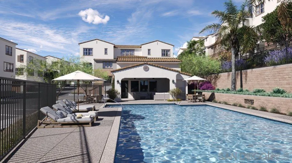 1812 Mountain Laurel Road San Marcos, CA 92078 - Photo 3 of 5 a patio with a table and chairs under an umbrella