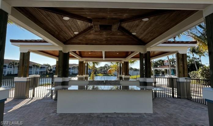 10274 Cape Roman Road, Unit 102 Estero, FL 34135 - Photo 12 of 24 Pool Side Bar