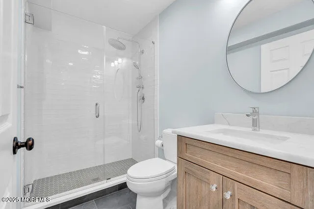 a view of a patio with table and chairs and potted plants
