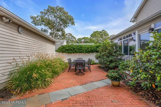 a view of a back yard of the house