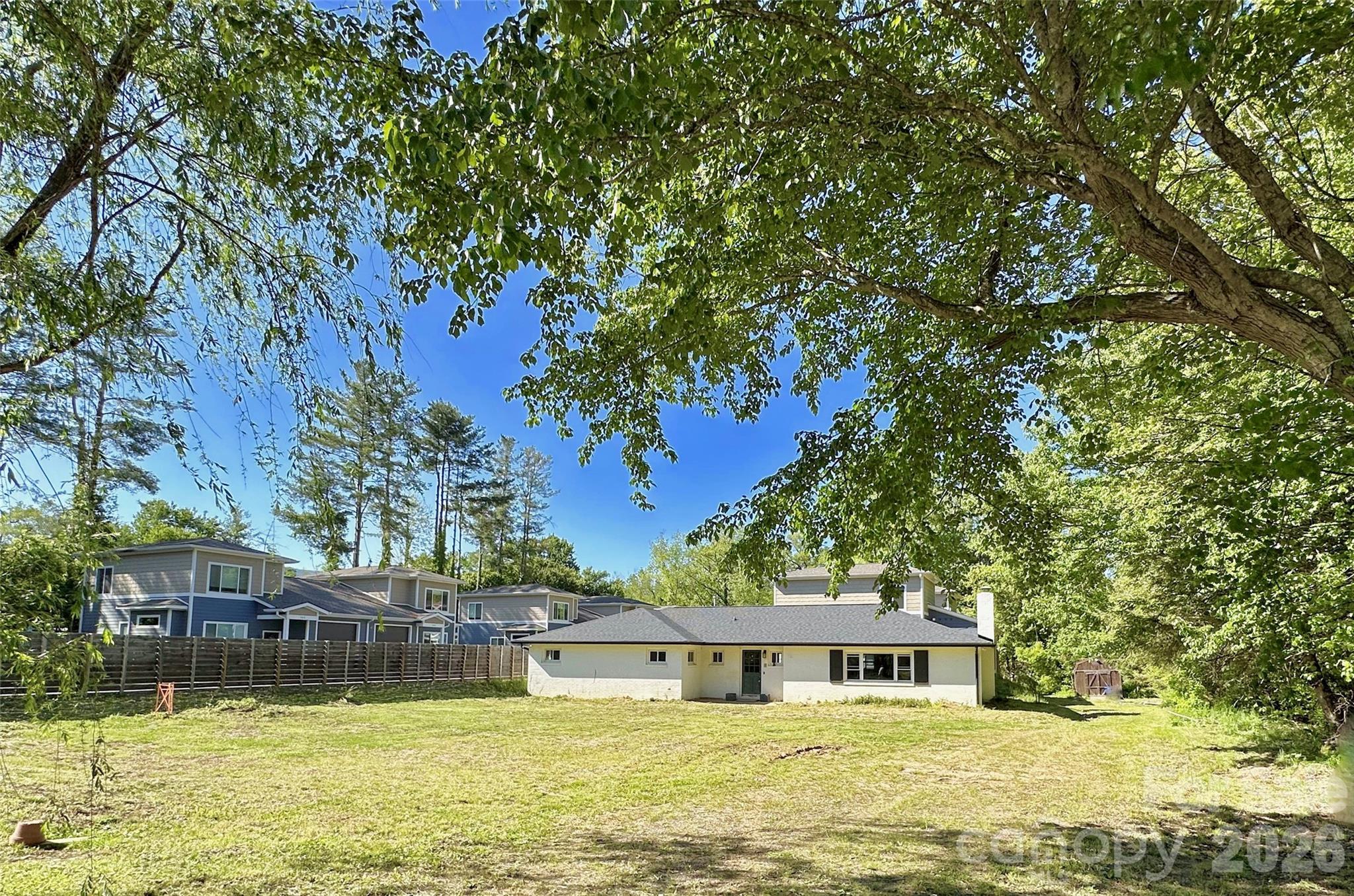 402 Blue Ridge Road Black Mountain, NC 28711 - Photo 1 of 18 a front view of a house with a yard