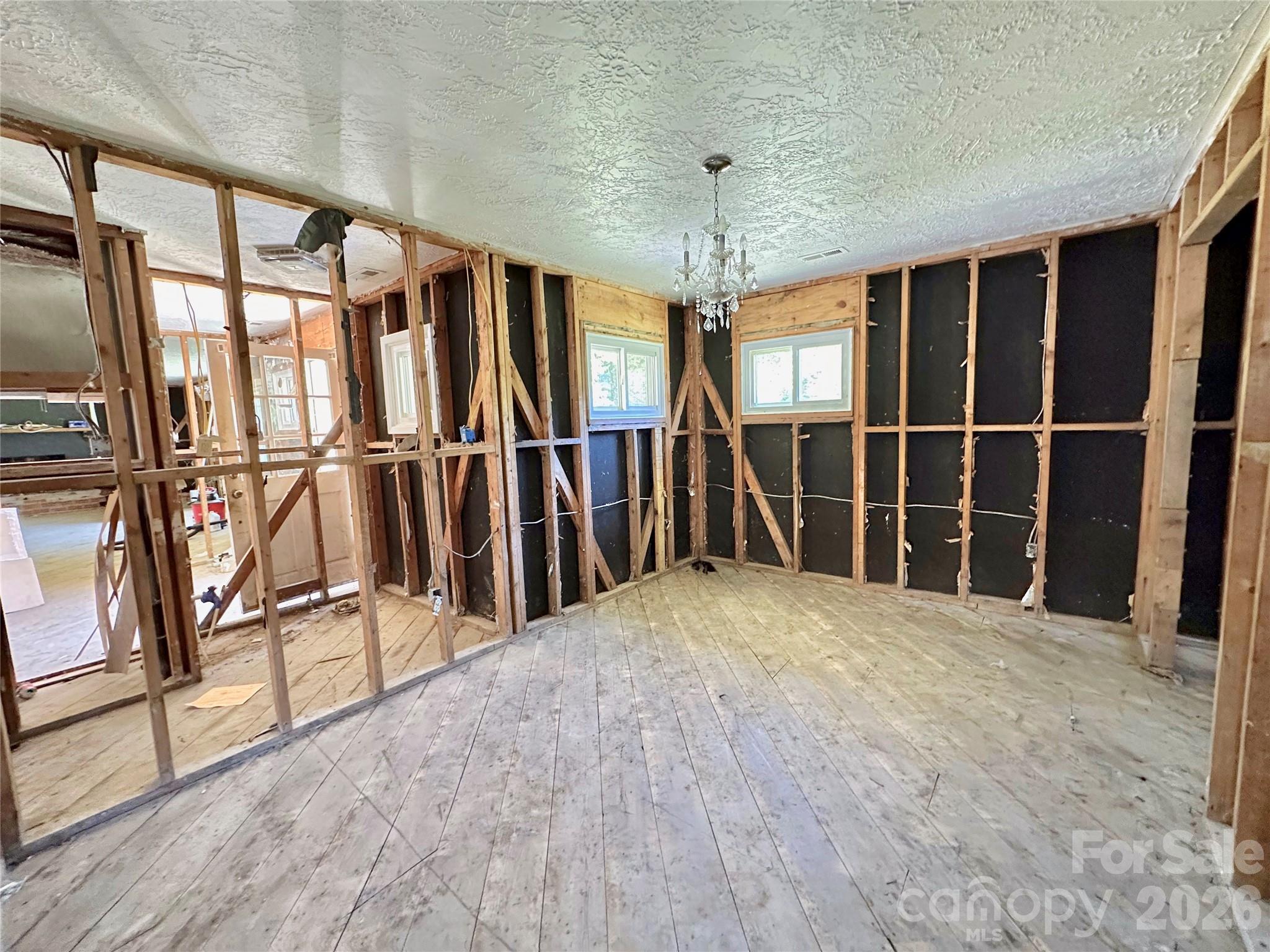 402 Blue Ridge Road Black Mountain, NC 28711 - Photo 11 of 18 a view of an empty room with a window