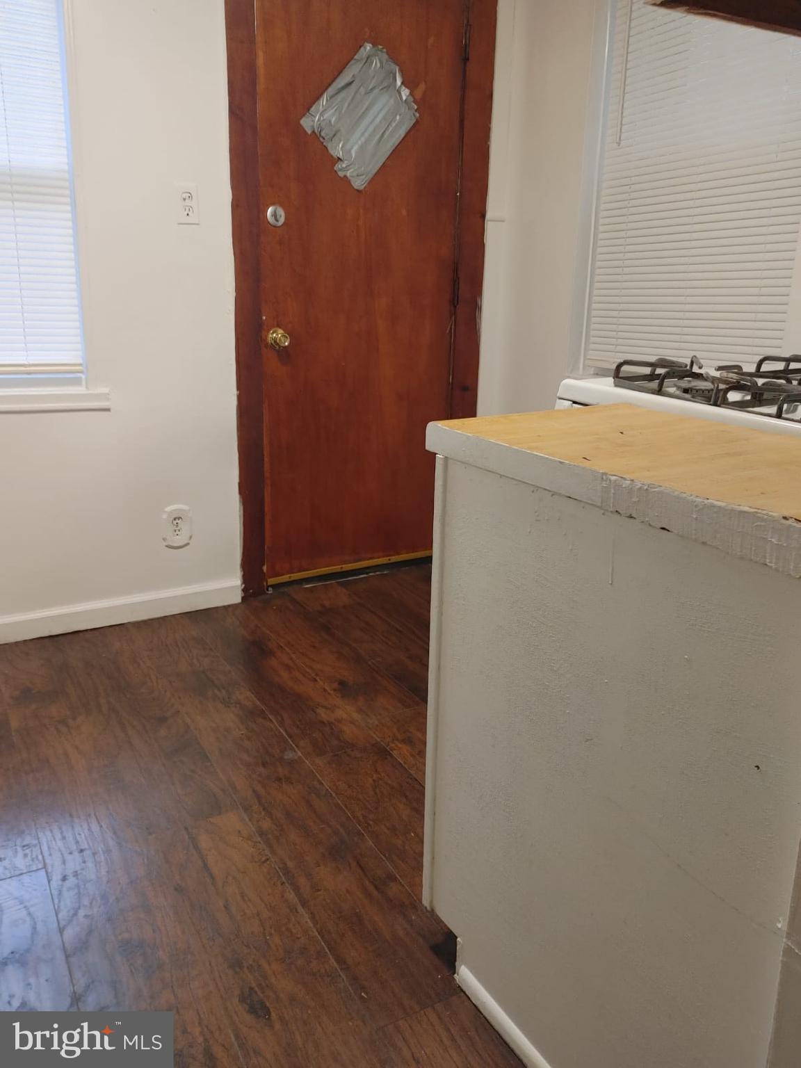 208-210 North Avondale Street Philadelphia, PA 19139 - Photo 12 of 15 an empty room with wooden floor