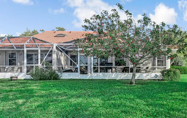 an aerial view of house with yard