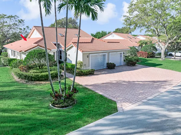 an aerial view of houses with yard