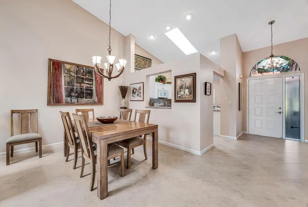 a view of a dining room with furniture