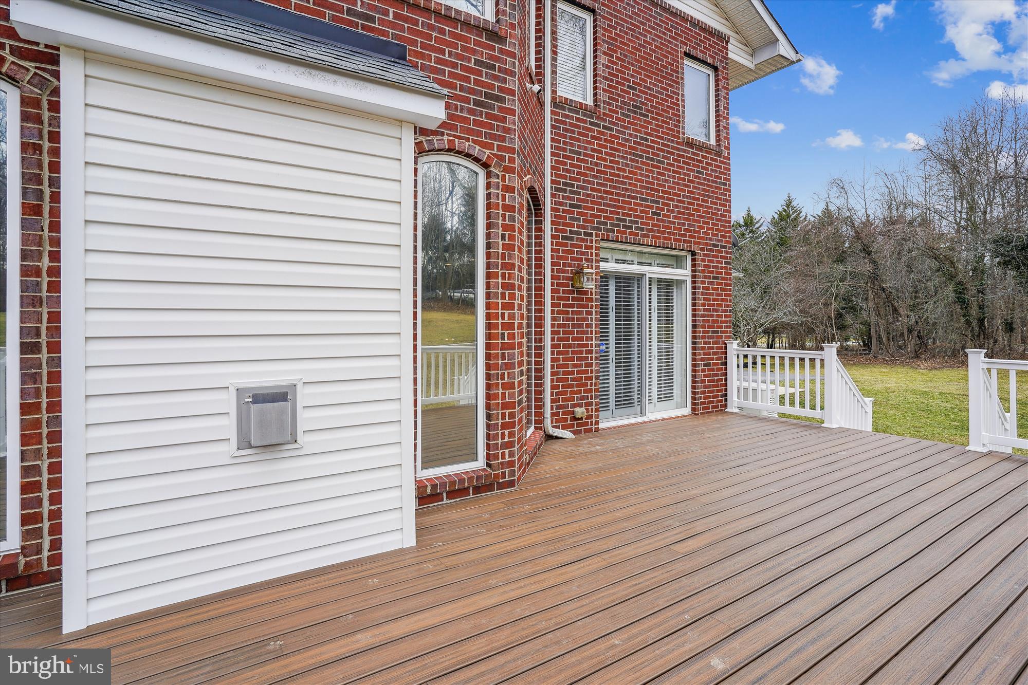 17410 Queen Anne Road Upper Marlboro, MD 20774 - Photo 14 of 82 a view of a house with a deck