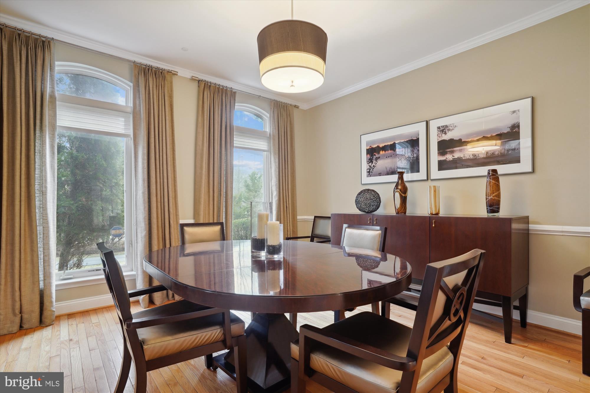 17410 Queen Anne Road Upper Marlboro, MD 20774 - Photo 16 of 82 a view of a dining room with furniture and wooden floor