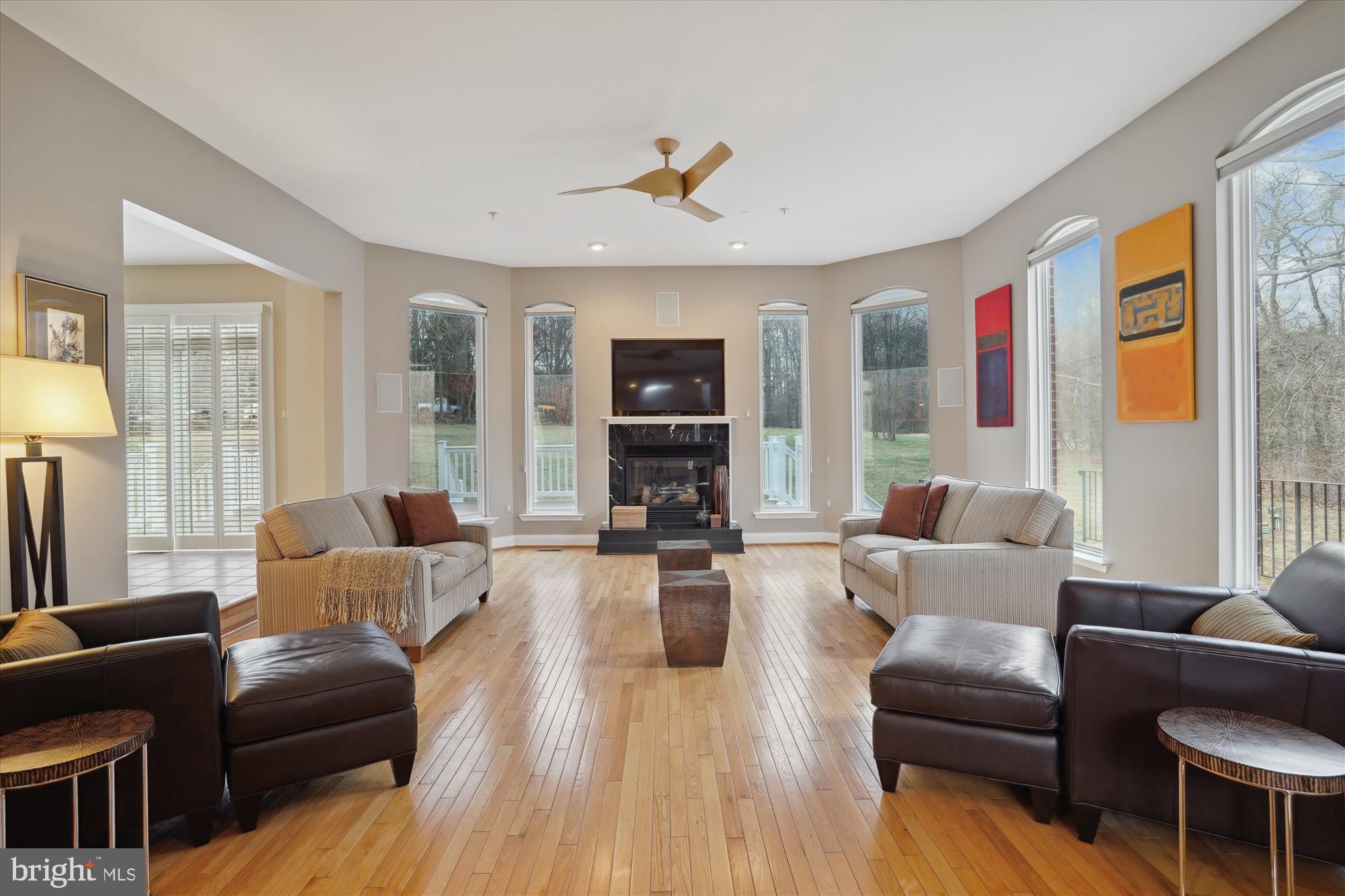 17410 Queen Anne Road Upper Marlboro, MD 20774 - Photo 23 of 82 a living room with furniture large window and wooden floor