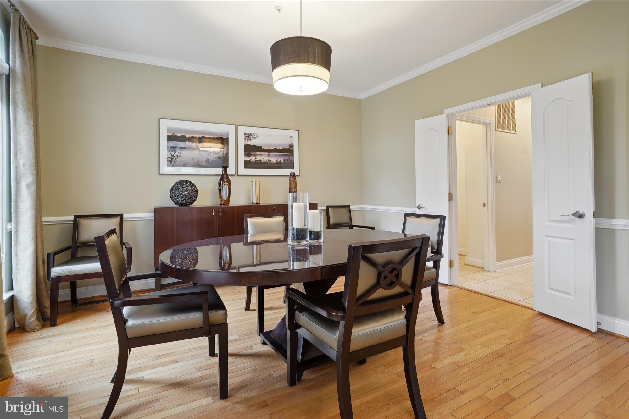 17410 Queen Anne Road Upper Marlboro, MD 20774 - Photo 29 of 82 a view of a dining room with furniture and wooden floor