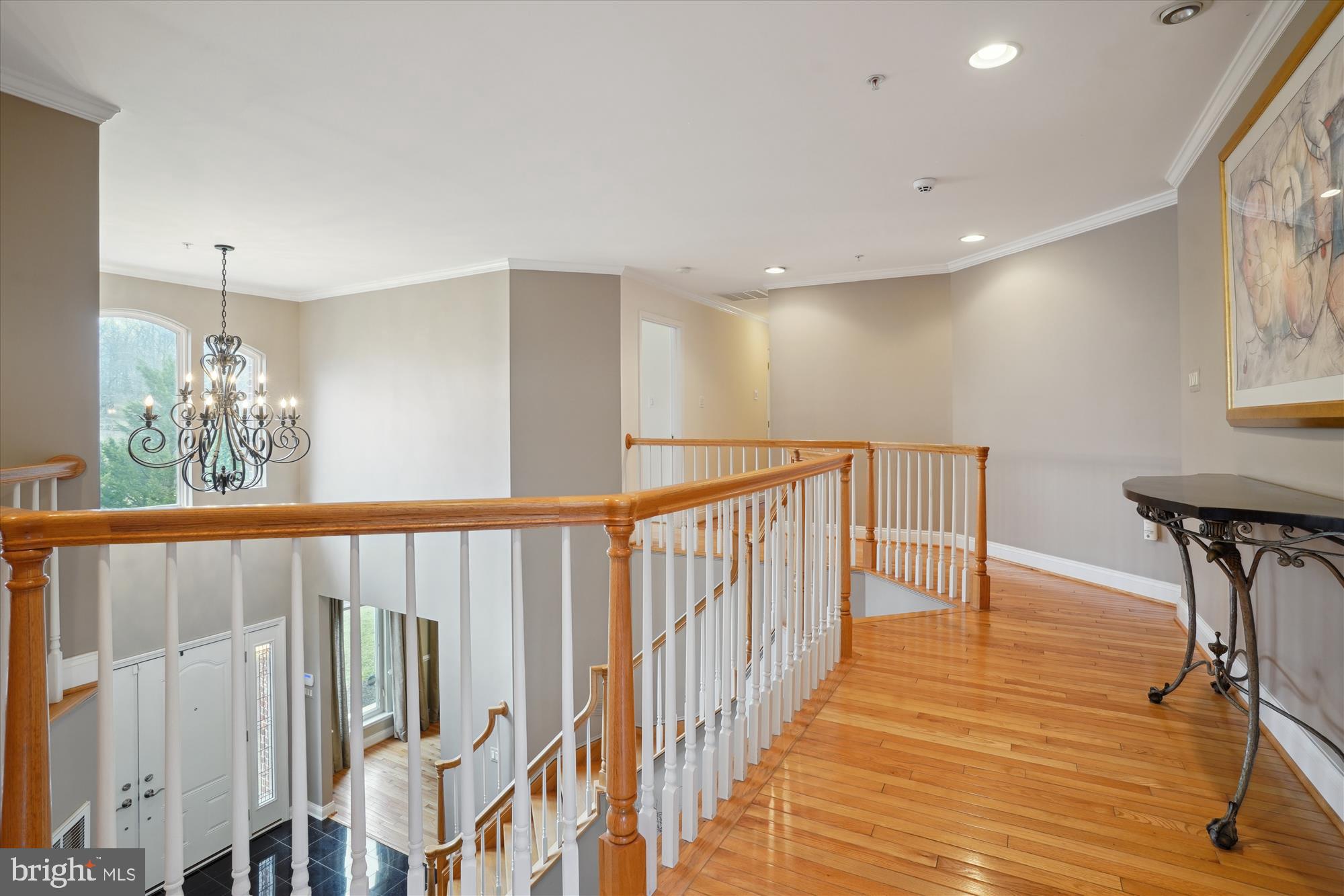 17410 Queen Anne Road Upper Marlboro, MD 20774 - Photo 48 of 82 a view of a hallway with wooden floor and stairs
