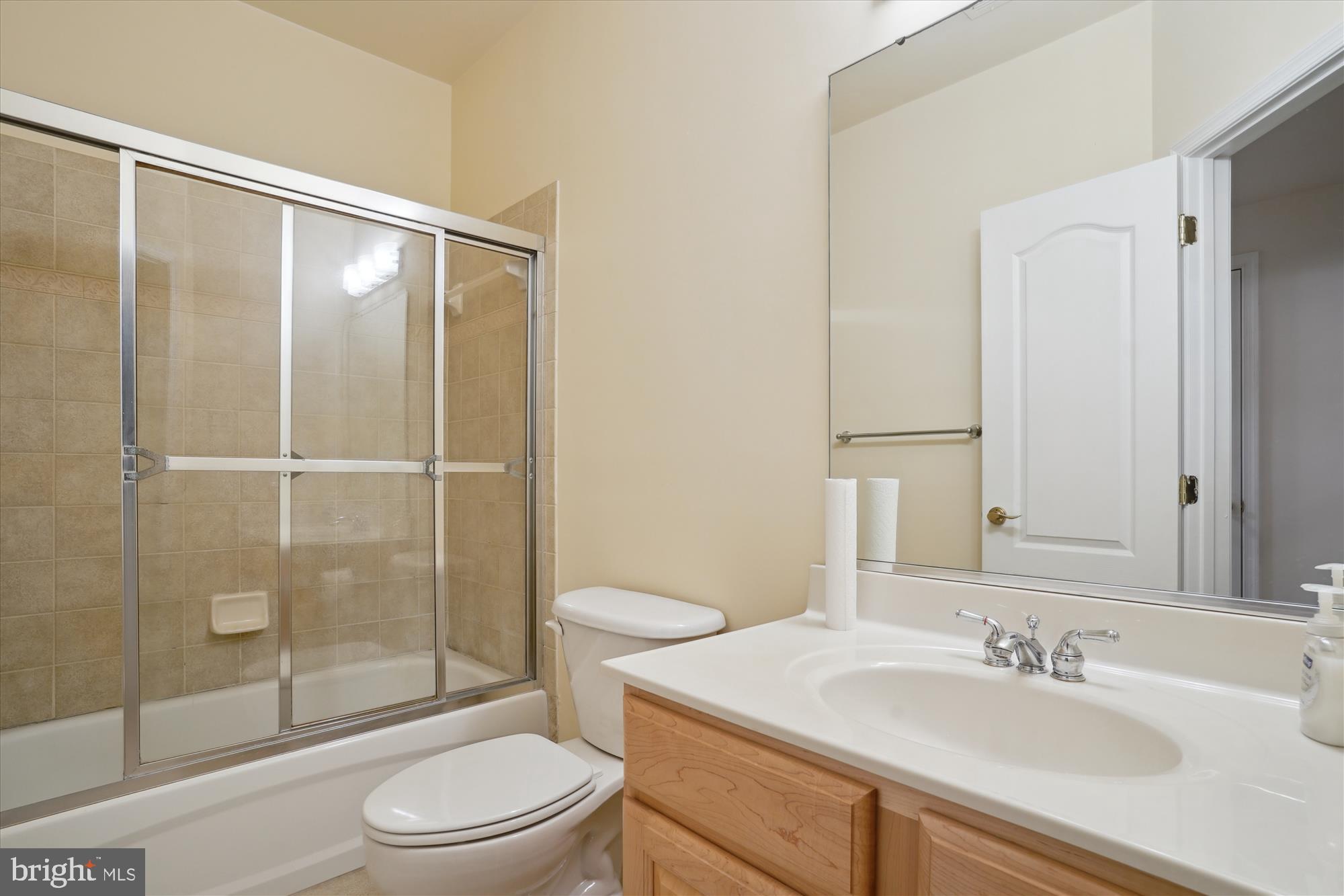 17410 Queen Anne Road Upper Marlboro, MD 20774 - Photo 68 of 82 a bathroom with a sink a toilet and shower