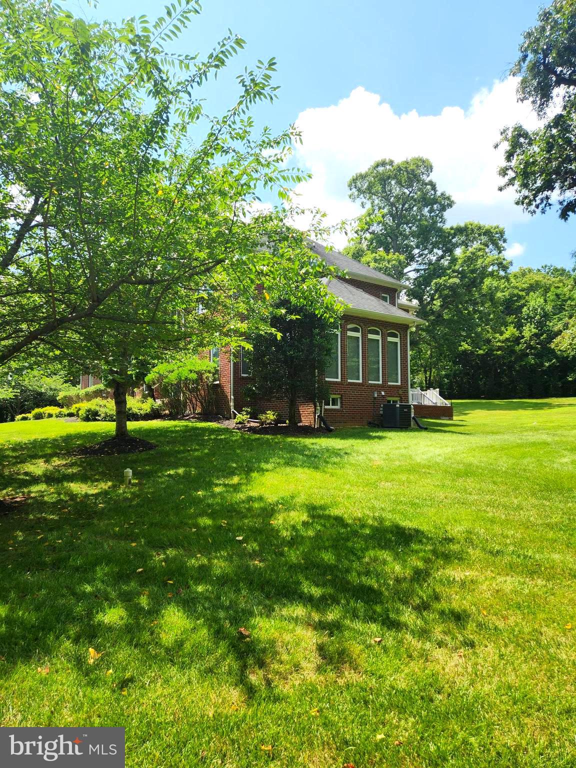 17410 Queen Anne Road Upper Marlboro, MD 20774 - Photo 80 of 82 a front view of house with yard and green space