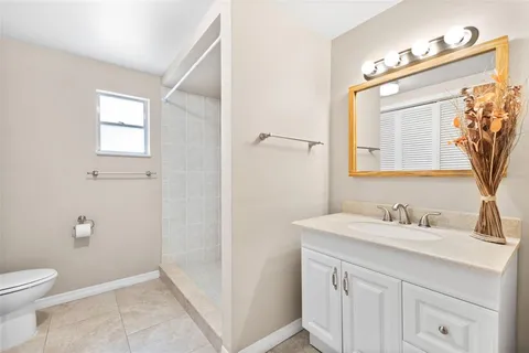 a view of a swimming pool with an outdoor space and seating area