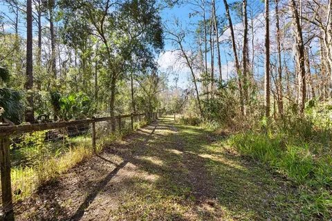 a house with trees in front of it