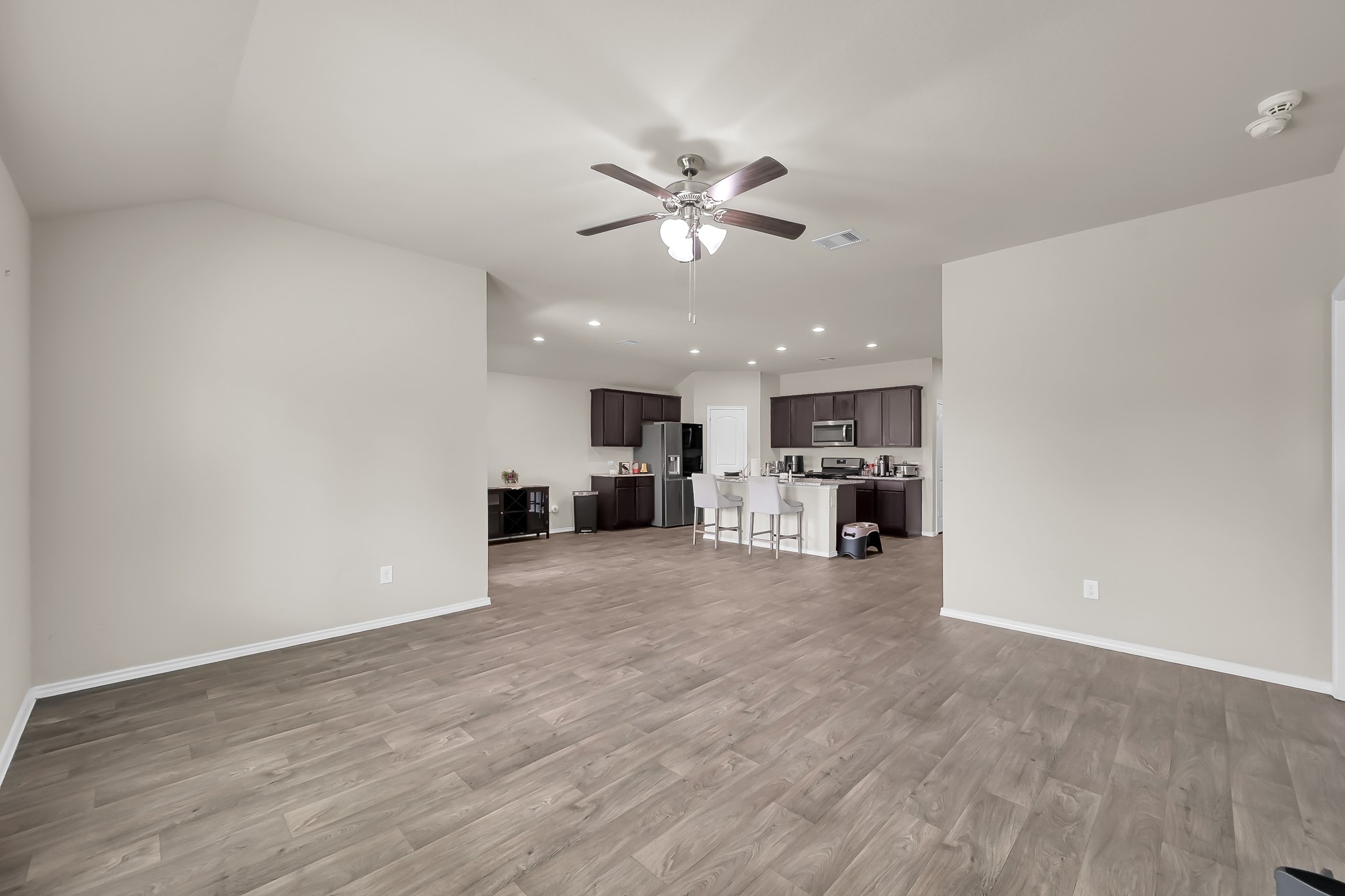 15015 Monserrat Lane Conroe, TX 77304 - Photo 19 of 41 a view of a kitchen with a sink and a window