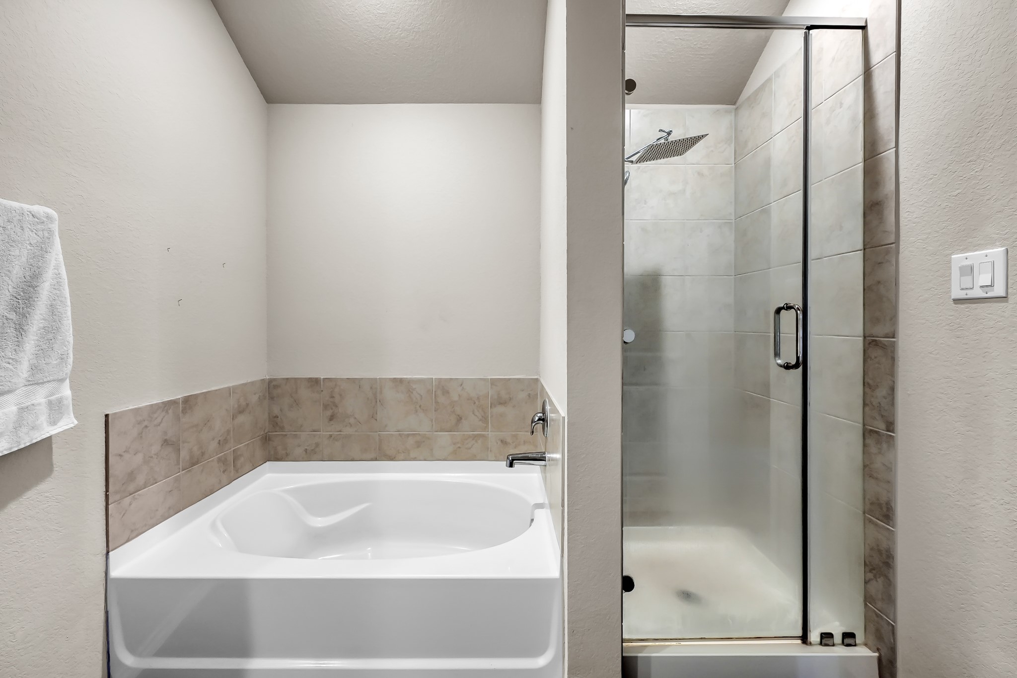 15015 Monserrat Lane Conroe, TX 77304 - Photo 24 of 41 a bathroom with a bathtub