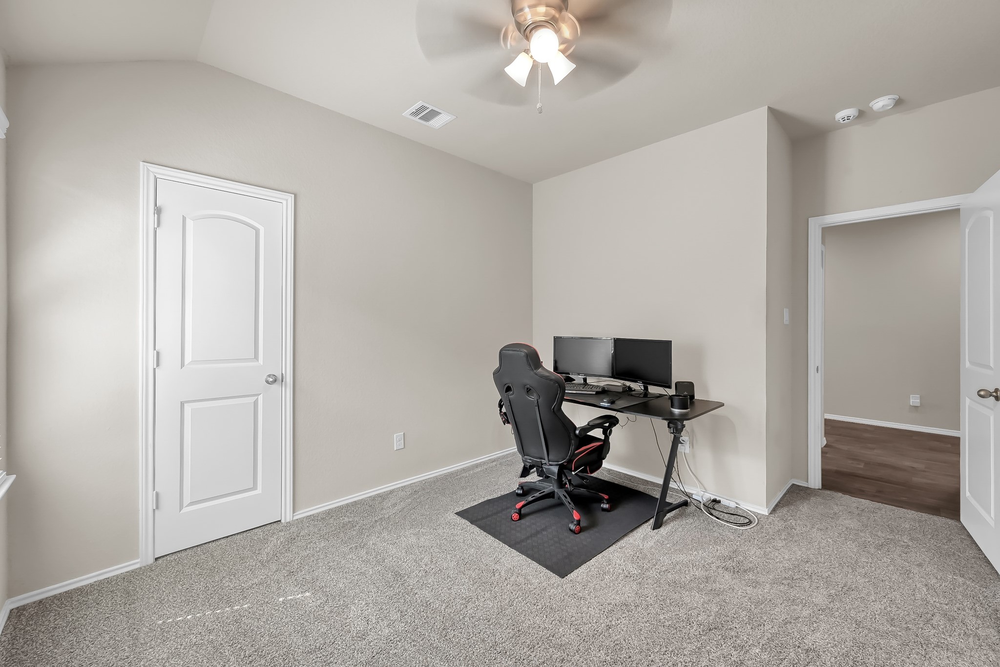 15015 Monserrat Lane Conroe, TX 77304 - Photo 31 of 41 a view of a workspace with furniture and a window