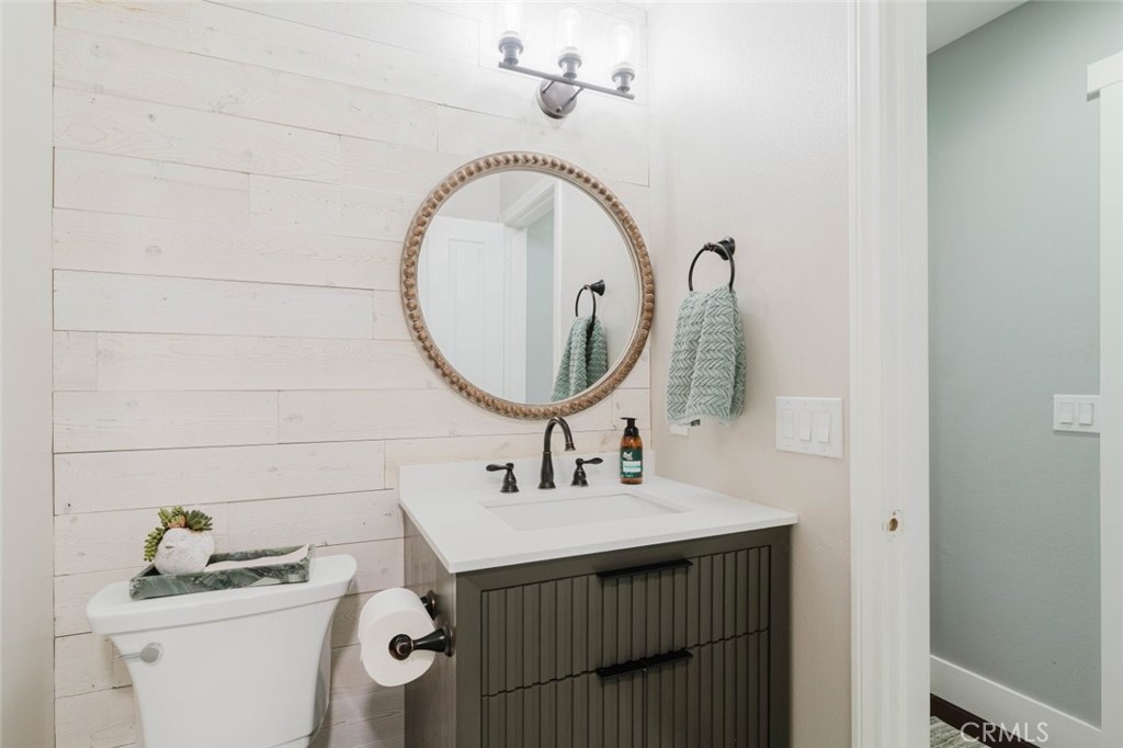 32480 The Old Road Castaic, CA 91384 - Photo 12 of 68 a bathroom with a sink a toilet and a mirror