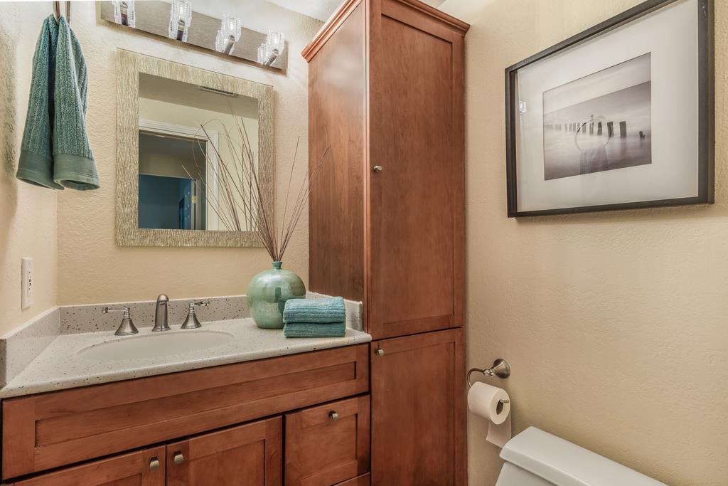 1372 Flicker Way Sunnyvale, CA 94087 - Photo 15 of 22 a bathroom with a sink and a mirror