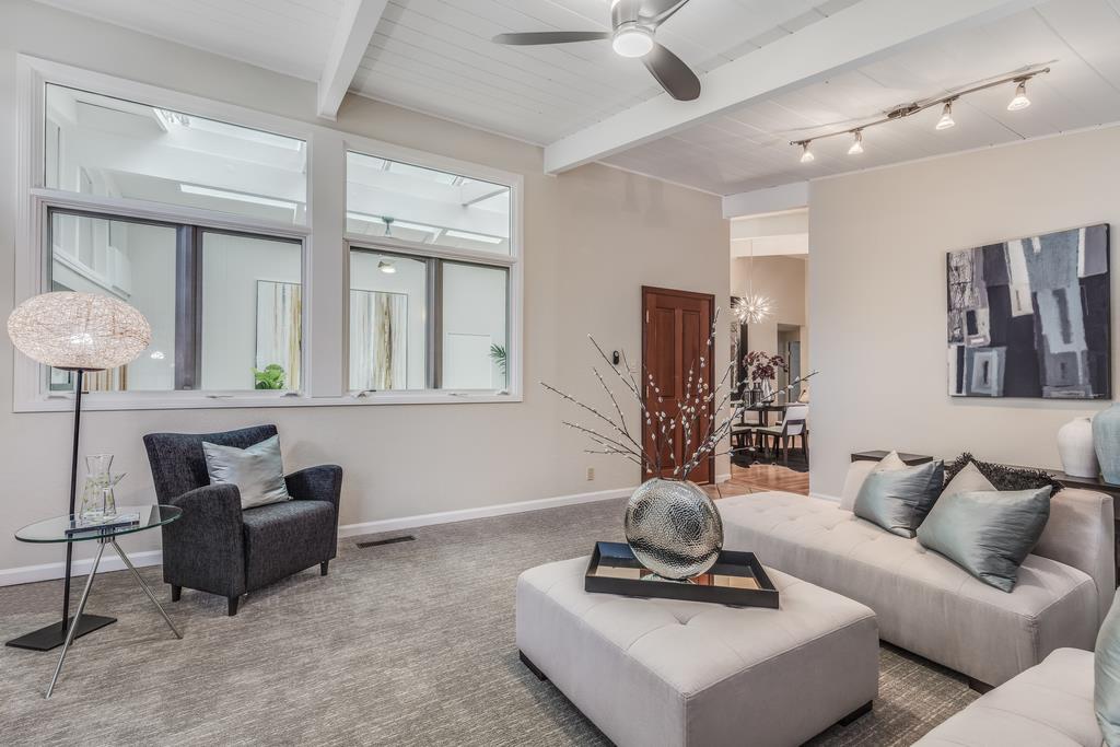 1372 Flicker Way Sunnyvale, CA 94087 - Photo 20 of 22 a living room with furniture and a table