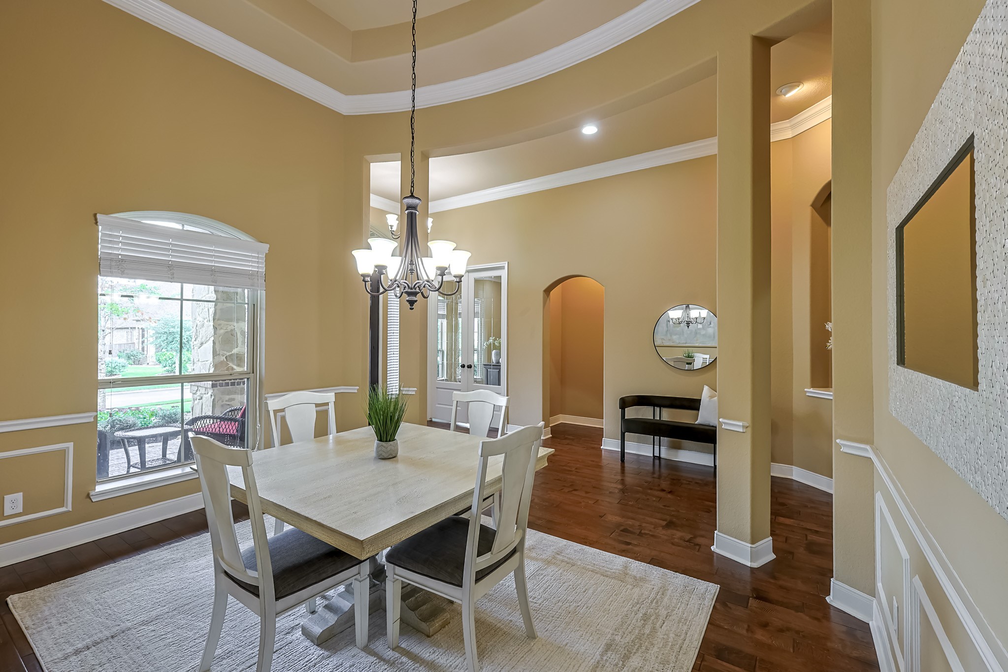 515 Mill Creek Road Pinehurst, TX 77362 - Photo 5 of 48 This photo showcases a spacious dining area with high ceilings and warm, neutral tones.