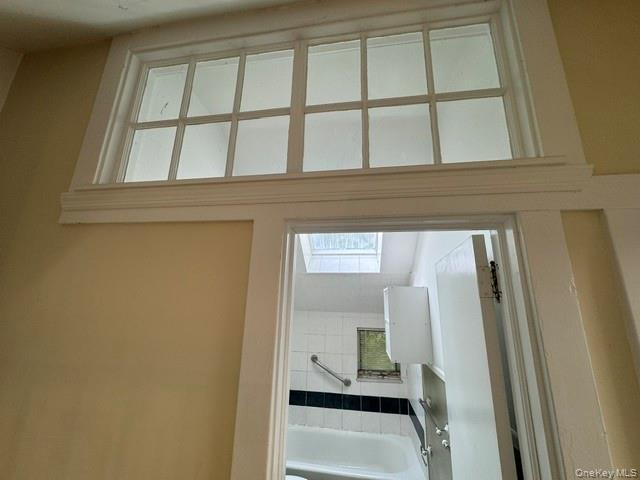 74 South Airmont Road Suffern, NY 10901 - Photo 26 of 42 Transom window above a doorway featuring white trim