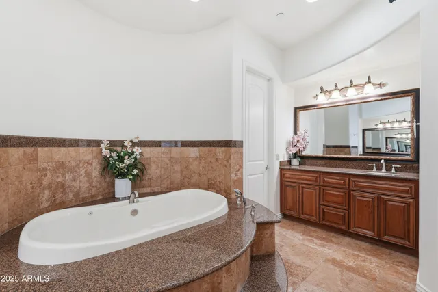 a view of a livingroom with a ceiling fan and window