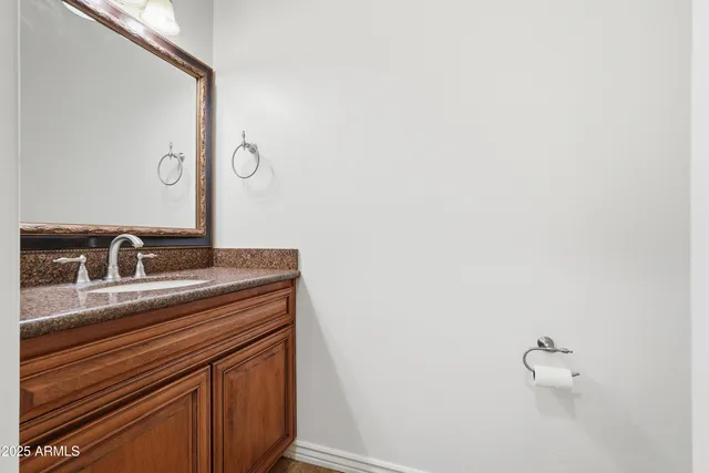 a view of a swimming pool with a yard