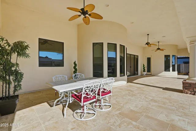 an aerial view of a house with a garden