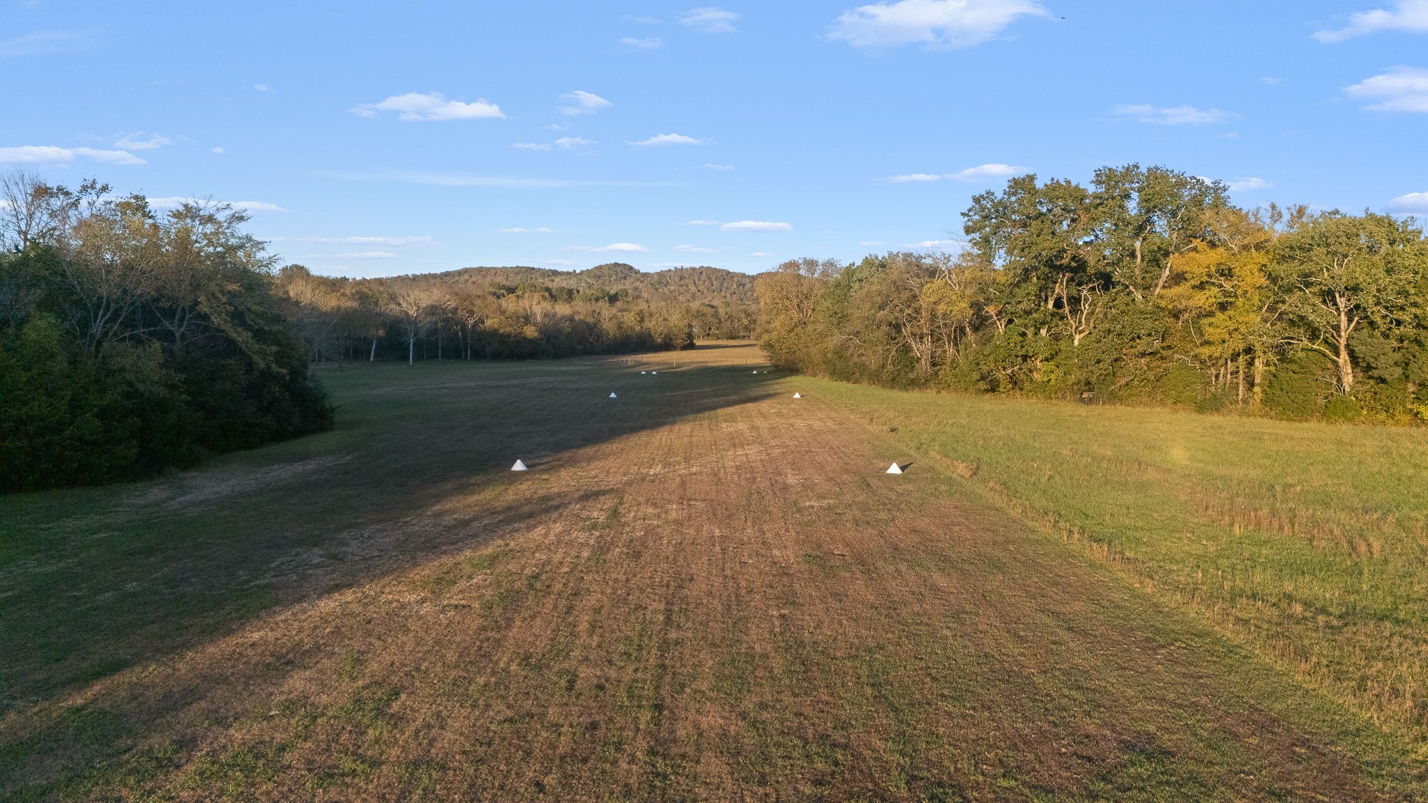 9203 Cobb Road Christiana, TN 37037 - Photo 26 of 96 a view of a lake with a mountain in the background