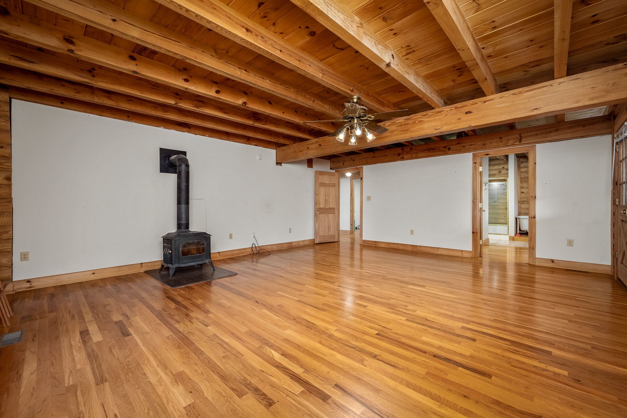 9203 Cobb Road Christiana, TN 37037 - Photo 55 of 96 a view of an empty room with wooden floor