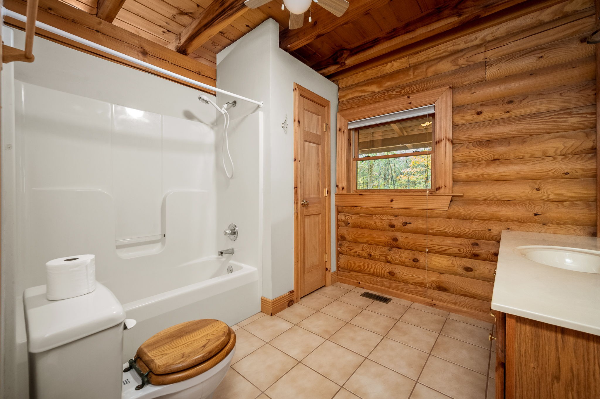9203 Cobb Road Christiana, TN 37037 - Photo 61 of 96 a bathroom with a sink a toilet and shower