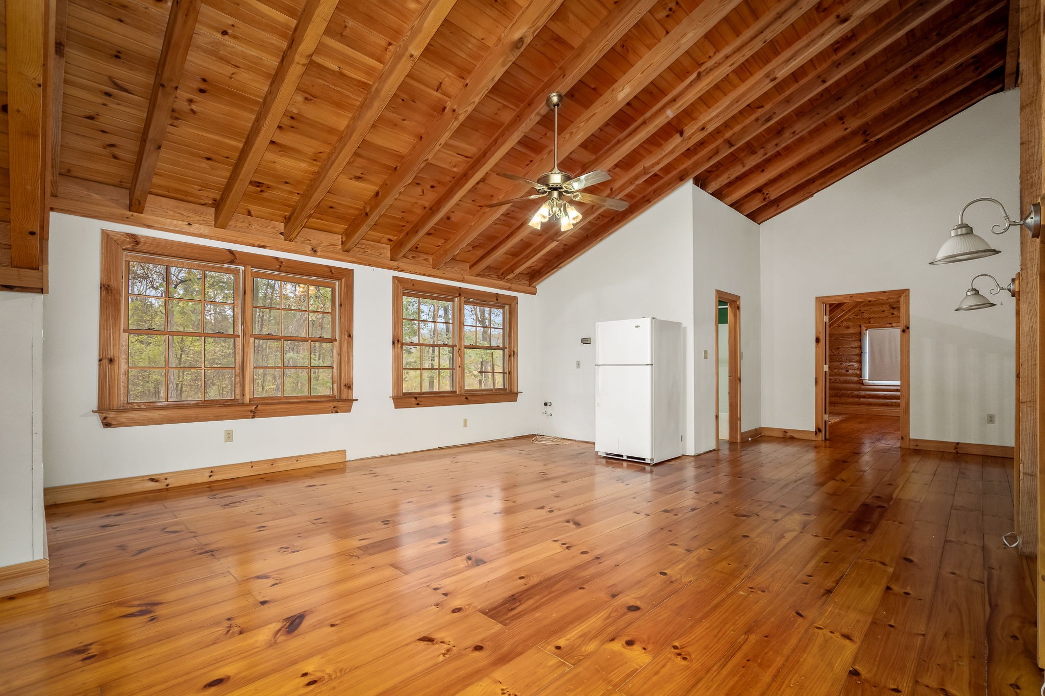 9203 Cobb Road Christiana, TN 37037 - Photo 66 of 96 a view of an empty room with a window and wooden floor