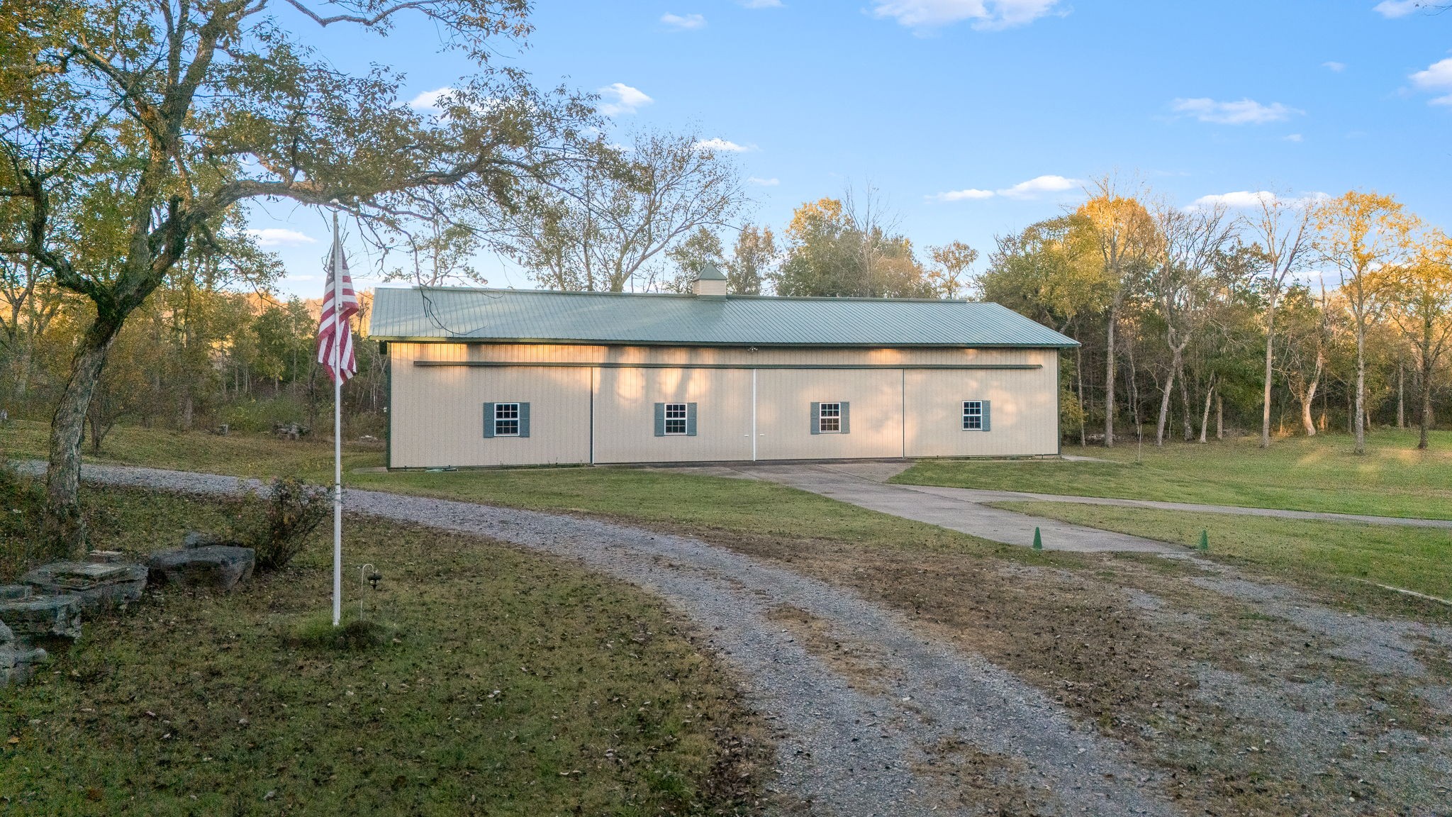 9203 Cobb Road Christiana, TN 37037 - Photo 88 of 96 a front view of a house with a yard and trees