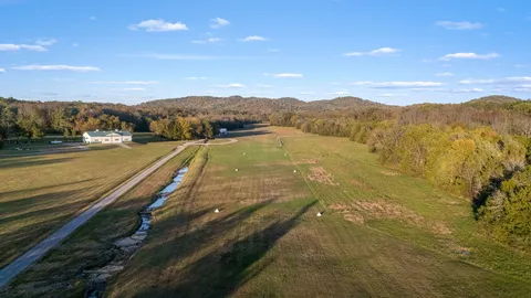 a view of an outdoor space with mountain view