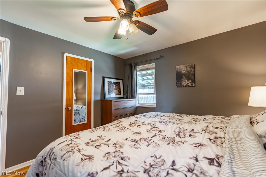 8320 Ackley Road Parma, OH 44129 - Photo 7 of 36 Bedroom with ceiling fan and hardwood / wood-style flooring