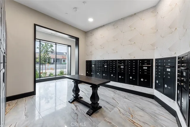a picture of a room with wooden floor and windows